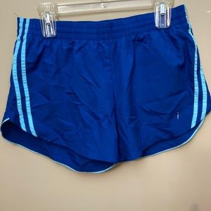blue running shorts with stripes